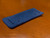The front of the blue shoulder pad