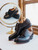 High quality black full grain leather toe cap shoes studio side profile with shoe tree and mirror reflection - Saddleback Leather