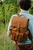 High quality front pocket backpack in light brown with model