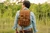 High quality front pocket backpack in light brown on a male