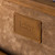 High quality leather trunk that will be a vintage antique one day in a museum. This is the leather tag on the inside. It is a tan brown steamer trunk that was old time luggage back in the day on trains and ships.