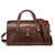 This is a red brown leather duffle bag that has three straps to close it and has two round handles from the front.