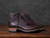 High quality side view of the Huntsman boot in dark brown