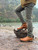High quality view of the Huntsman boot in natural patina in outdoors