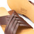 High quality top down image of the dark brown womens sandals