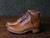 High quality side view of the Huntsman boot in natural patina