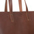 This is the up close view of the simple leather tote in reddish brown color