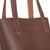 This is the up close view of the small reddish brown leather tote
