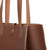 This is the side strap view of the women's leather tote in red brown