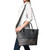 This is the model view of the leather zipper tote in black leather