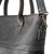 This is the up close side  view of the leather zipper tote in black leather