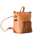 High quality this tan leather woman's backpack is showing the side view