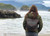 High quality this dark brown women's leather backpack is on Suzette's back at the beach.