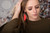model images of the red leather feather earrings