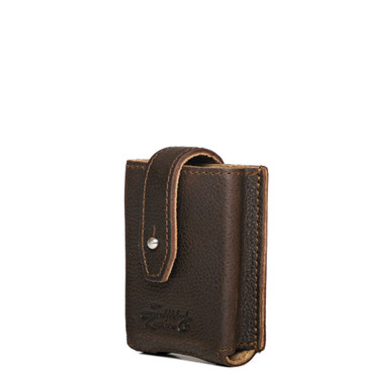 This is the leather deck holder opened with a deck of playing cards coming out. Made by Saddleback