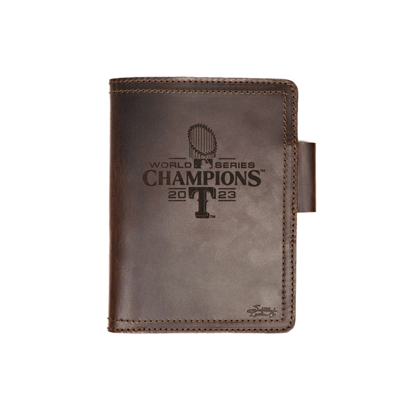 A premium leather journal cover featuring the Texas Rangers World Series logo, handcrafted for durability and style. Fits a variety of planners and notebooks, perfect for Rangers fans.