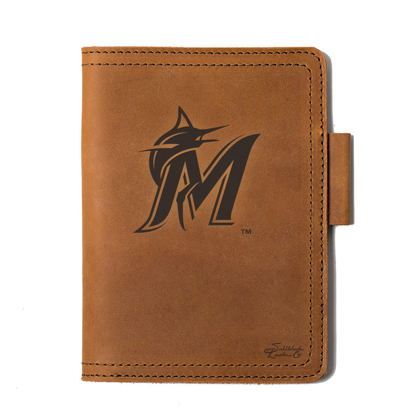 High quality tan colored leather journal cover that has the Miami Marlins logo on the front. Made by Saddleback