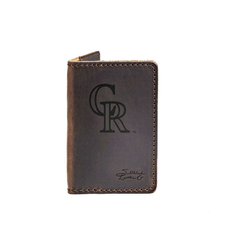 High quality dark brown colored leather business card holder with the Colorado Rockies logo on it, made by Saddleback
