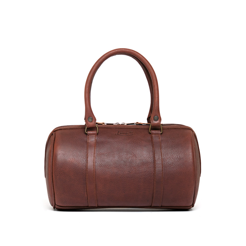 This is the front view of the everyday barrel purse in reddish brown