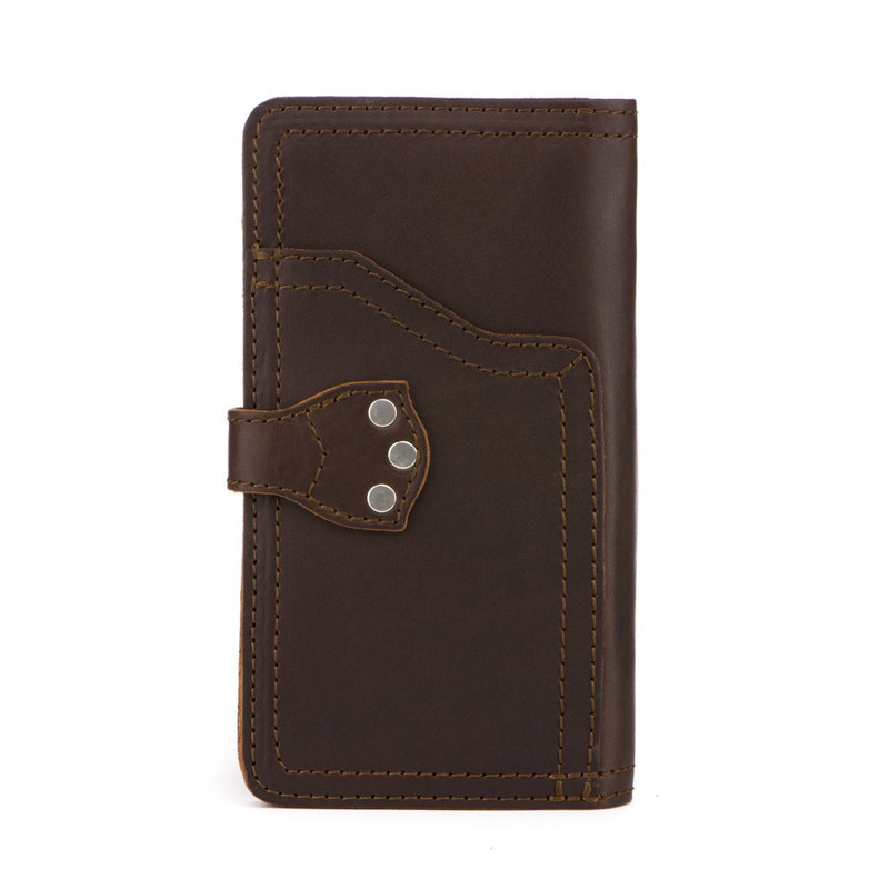 This is the back of a dark brown really large leather wallet.