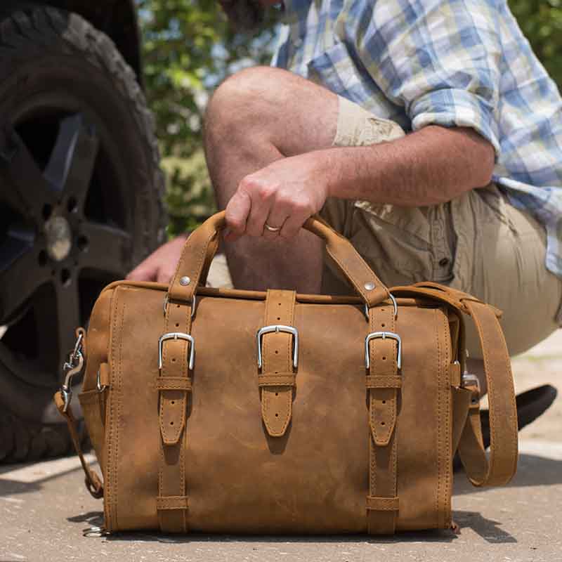 This Doctor's Leather Duffle Bag is designed to be over-engineered, with no breakable parts like magnets or zippers or snaps or buttons, and all stress points are reinforced with rivets.