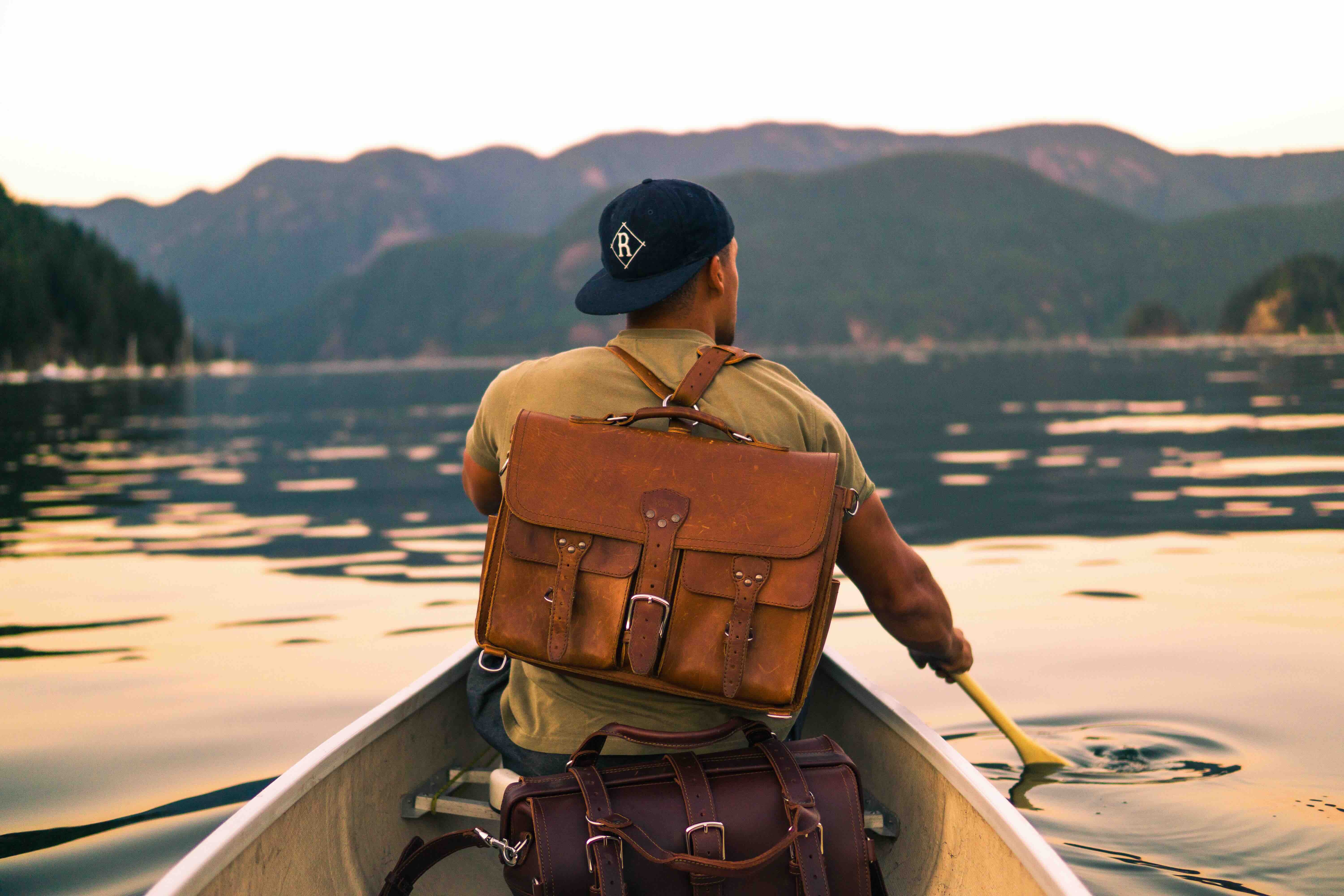 Leather briefcase worn in backpack mode by Saddleback.