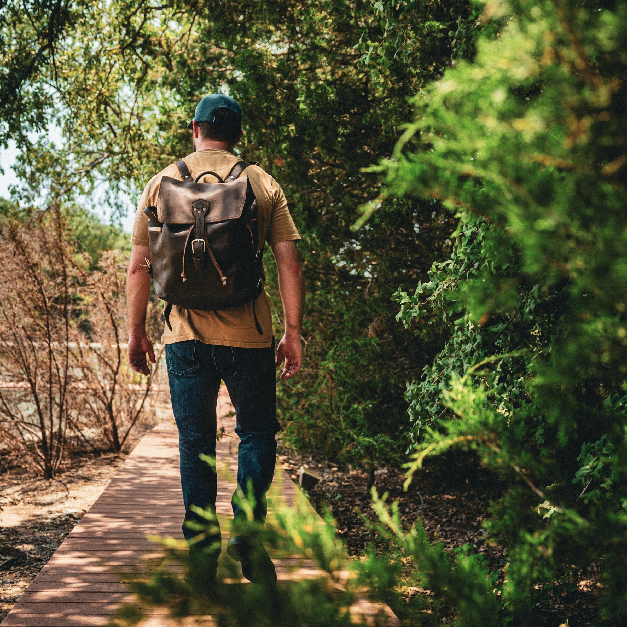 The 16" Leather Drawstring Backpack is simple and functional, with a wide open top and pigskin-lined back, as well as a laptop pocket that fits a 13” Macbook.