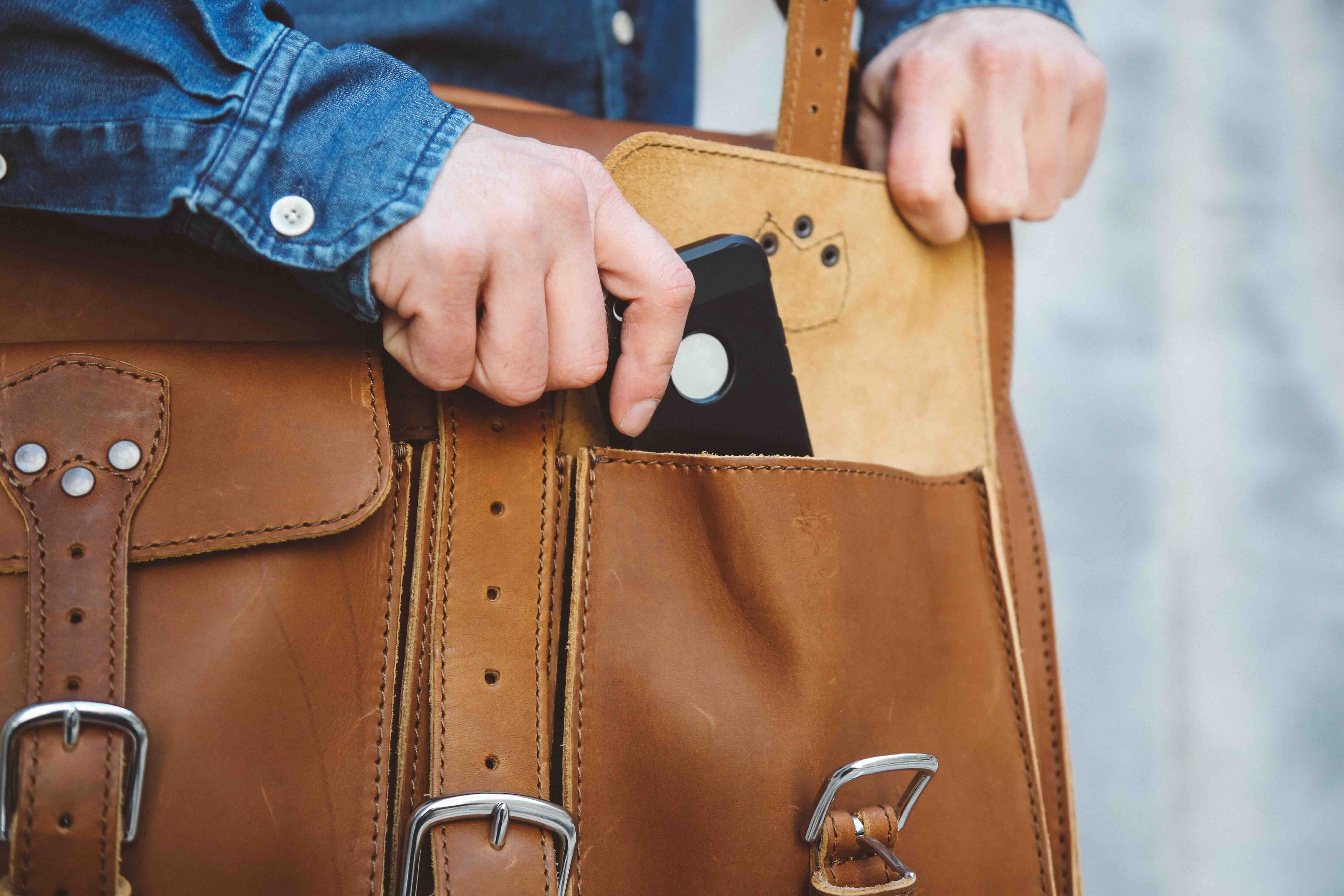 Full grain leather briefcase with front pockets.