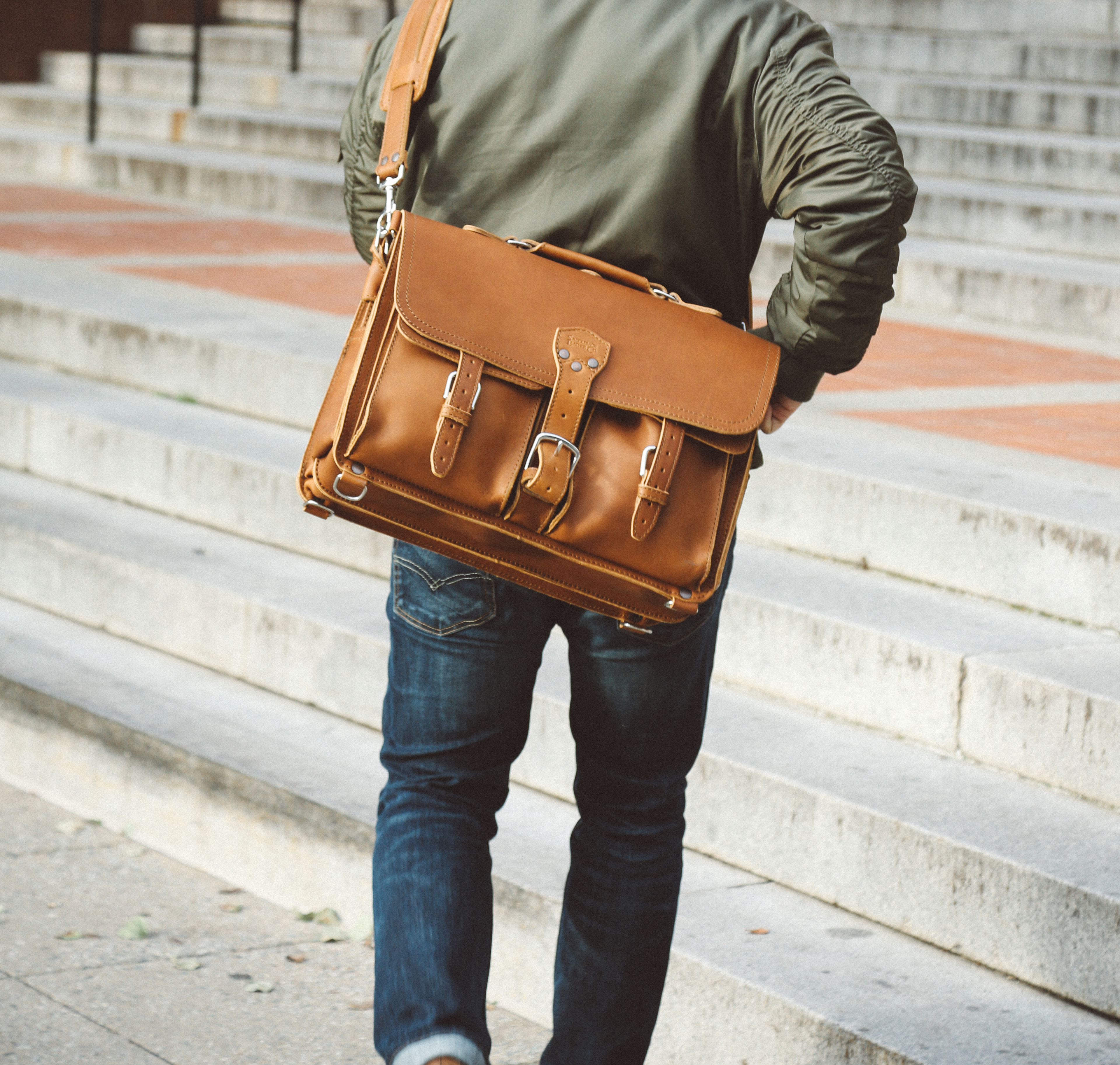 Tan full grain leather briefcase by Saddleback.