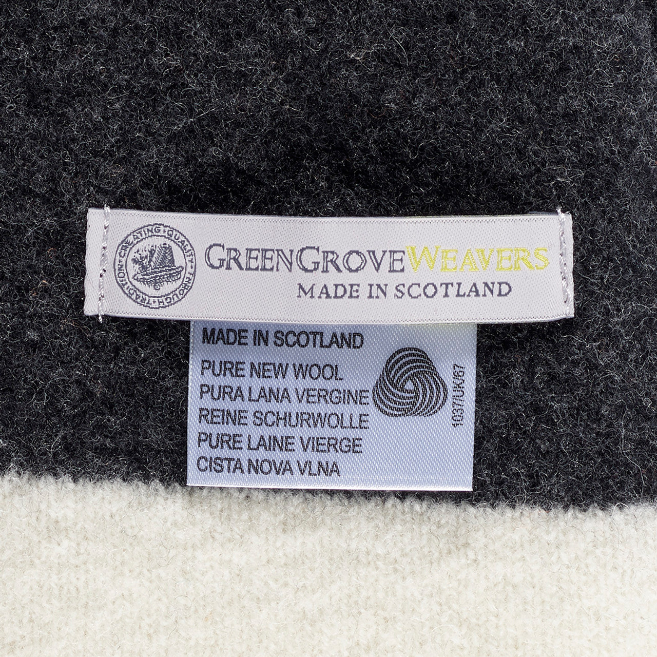 100 pure new wool in orange white grey and black throw