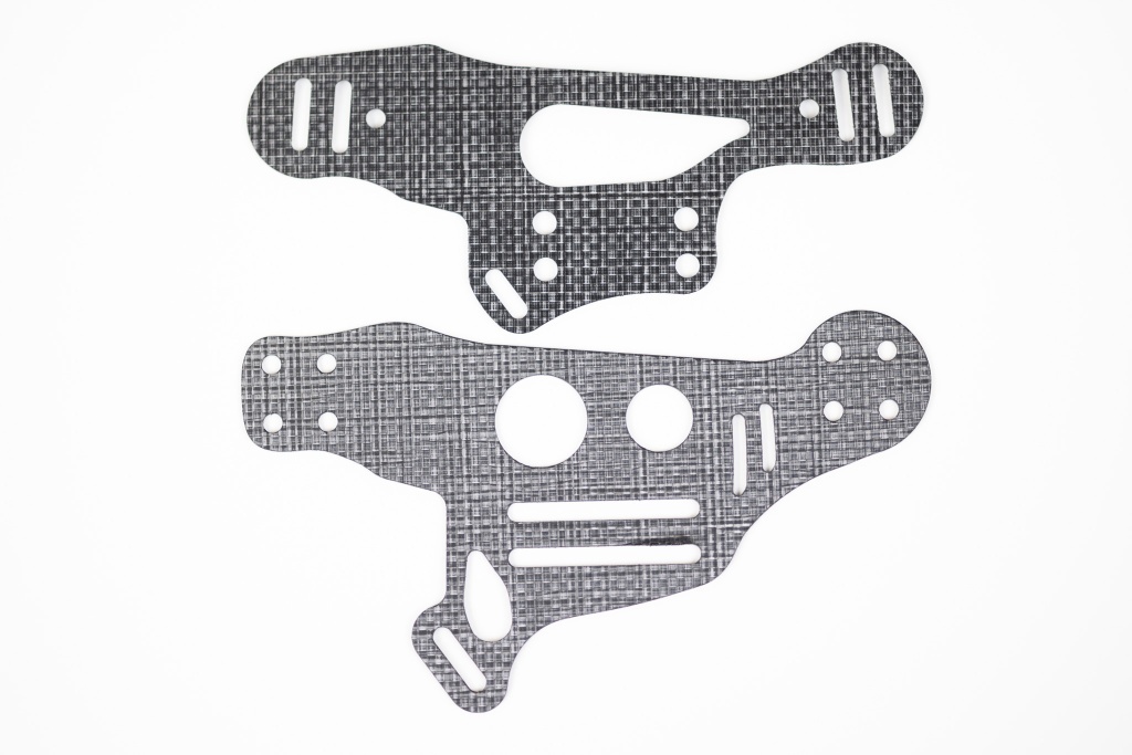 Comparison photo of Light Bearing Enigma faceplates.