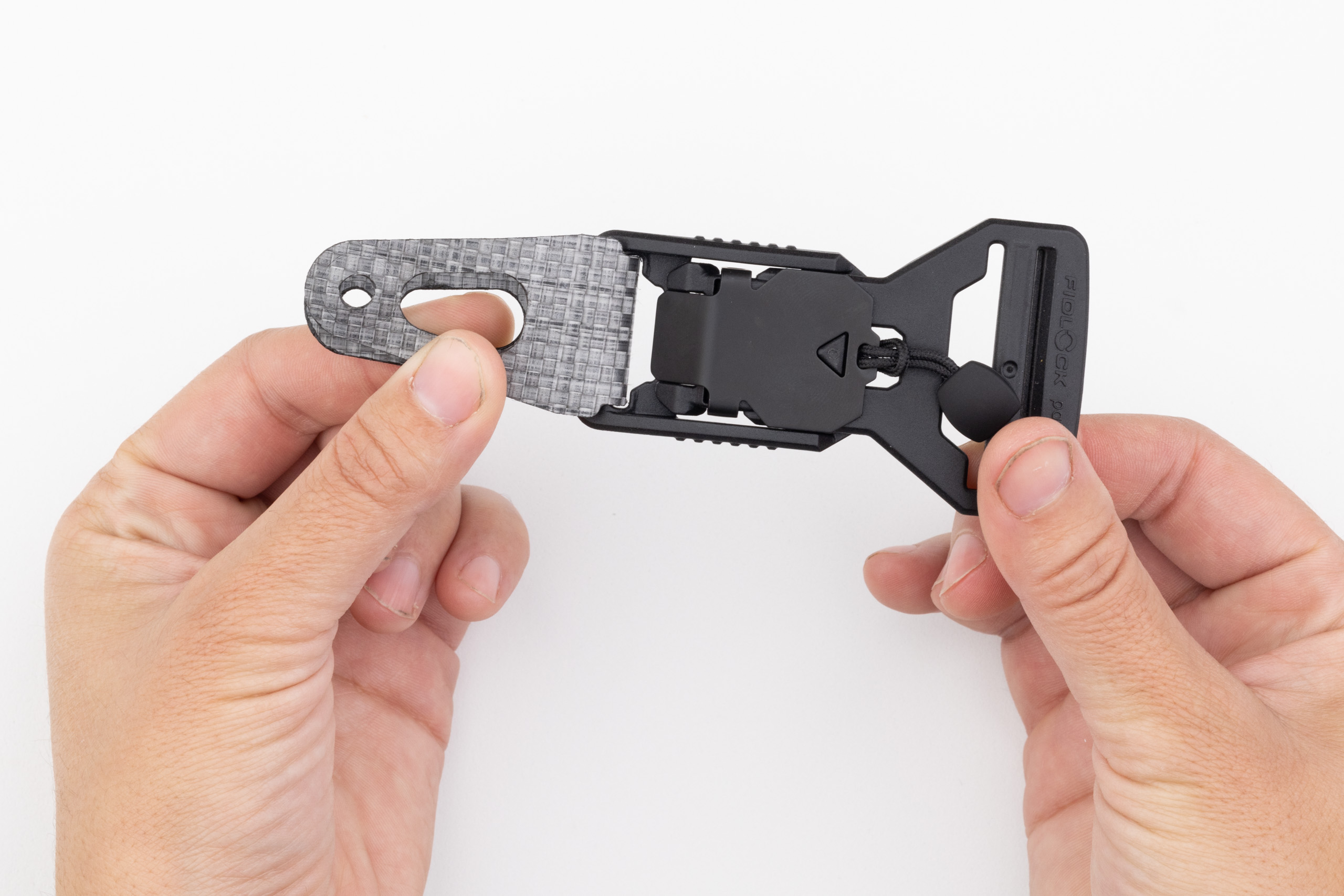 Photo of buckle capture installed on buckle.