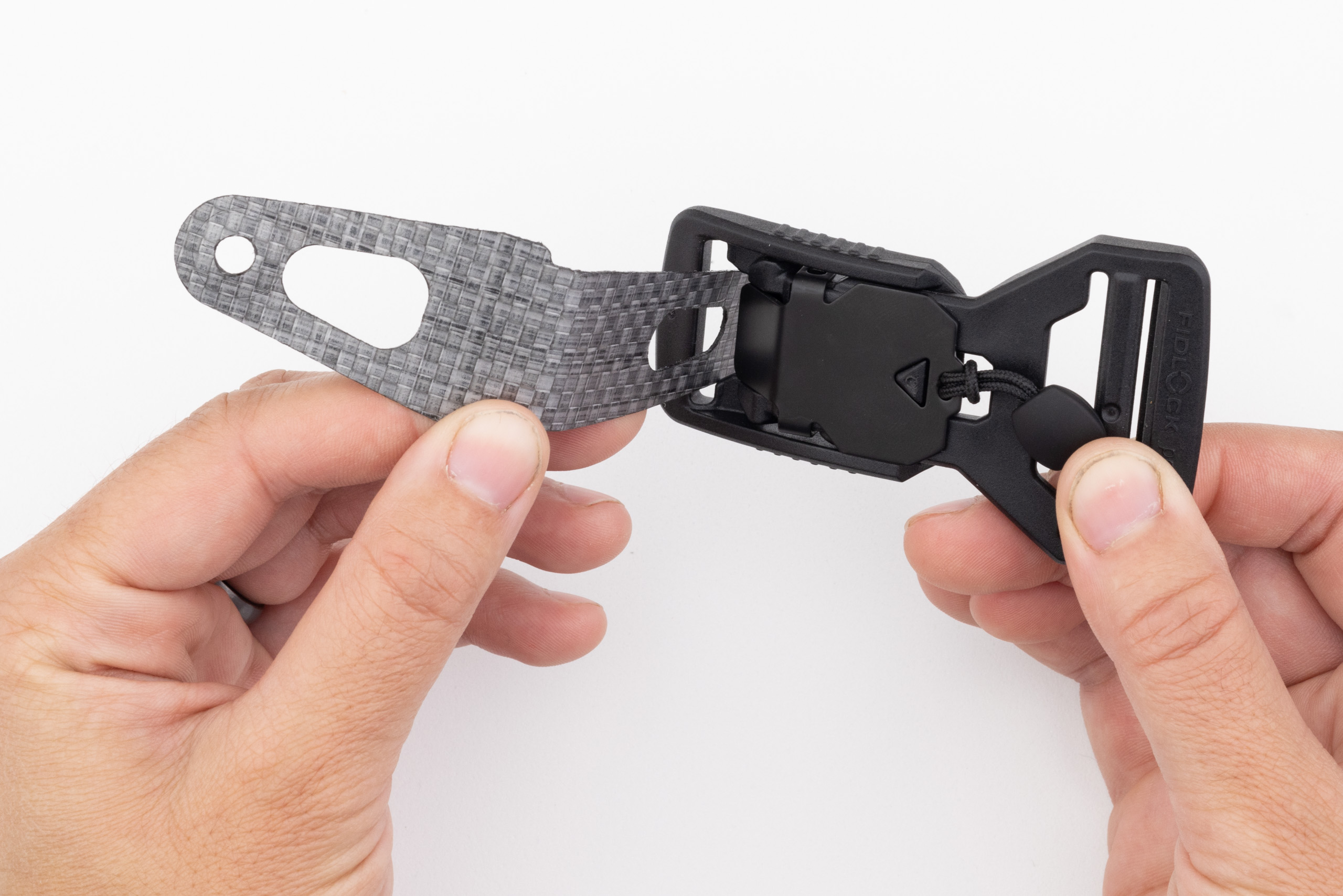 Photo of Enigma buckle capture and Fidlock magnetic buckle.