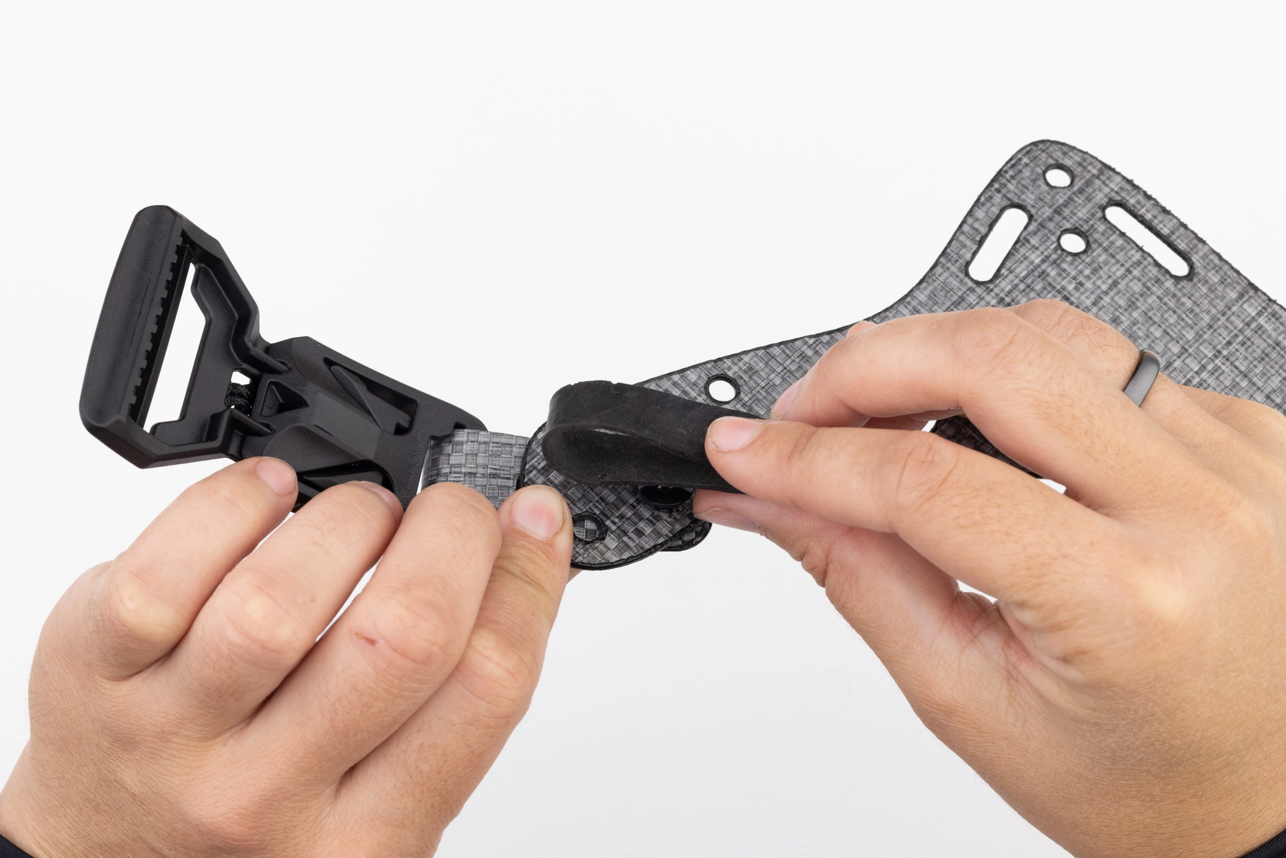 Photo of rubber band used to tighten Enigma screws.