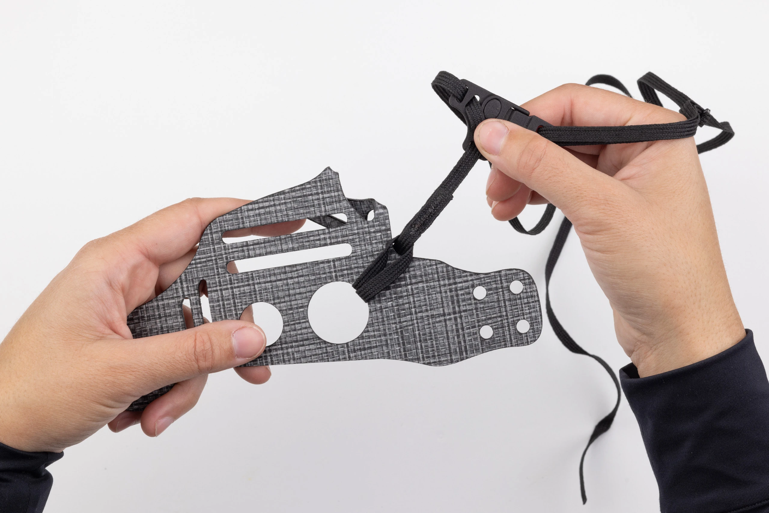 Photo showing leg leash routed through large faceplate hole.