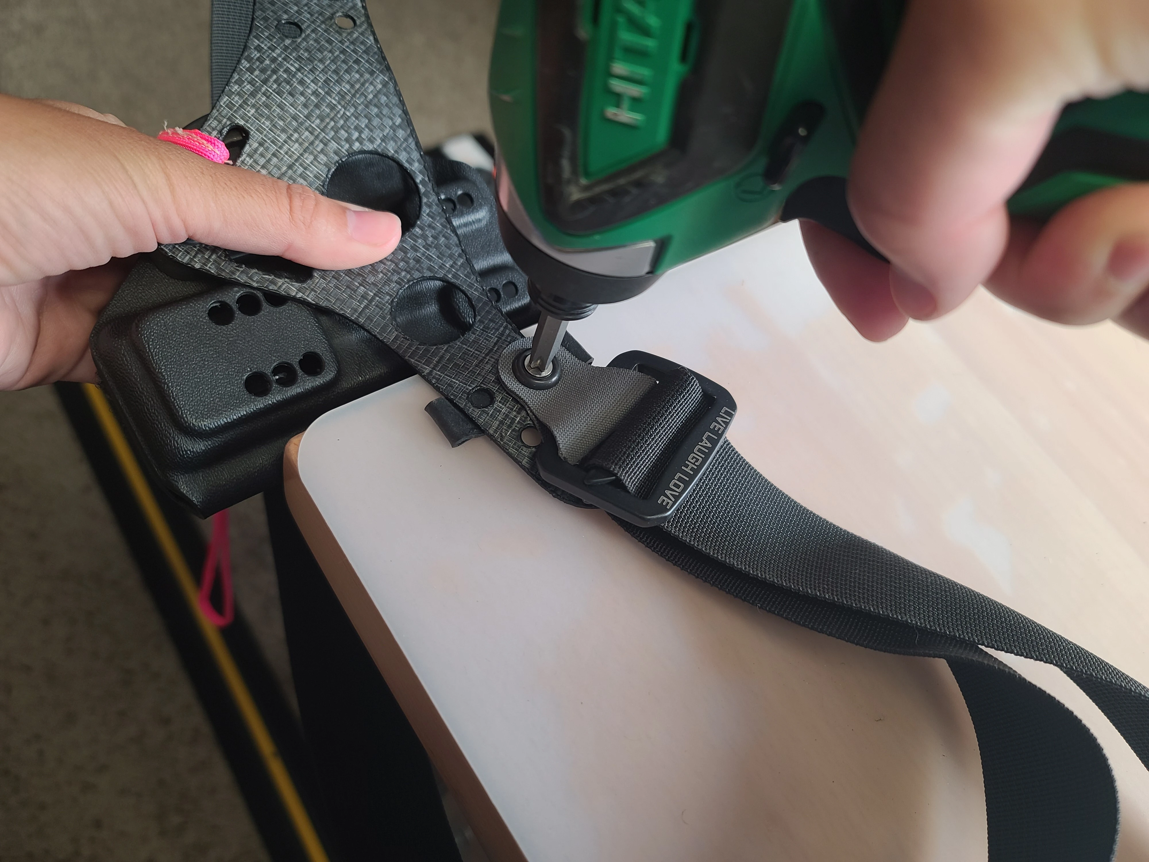 Photo of best technique to tighten PHLster Enigma screws.