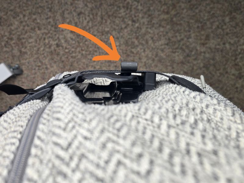 Photograph of holster with clip sticking out.