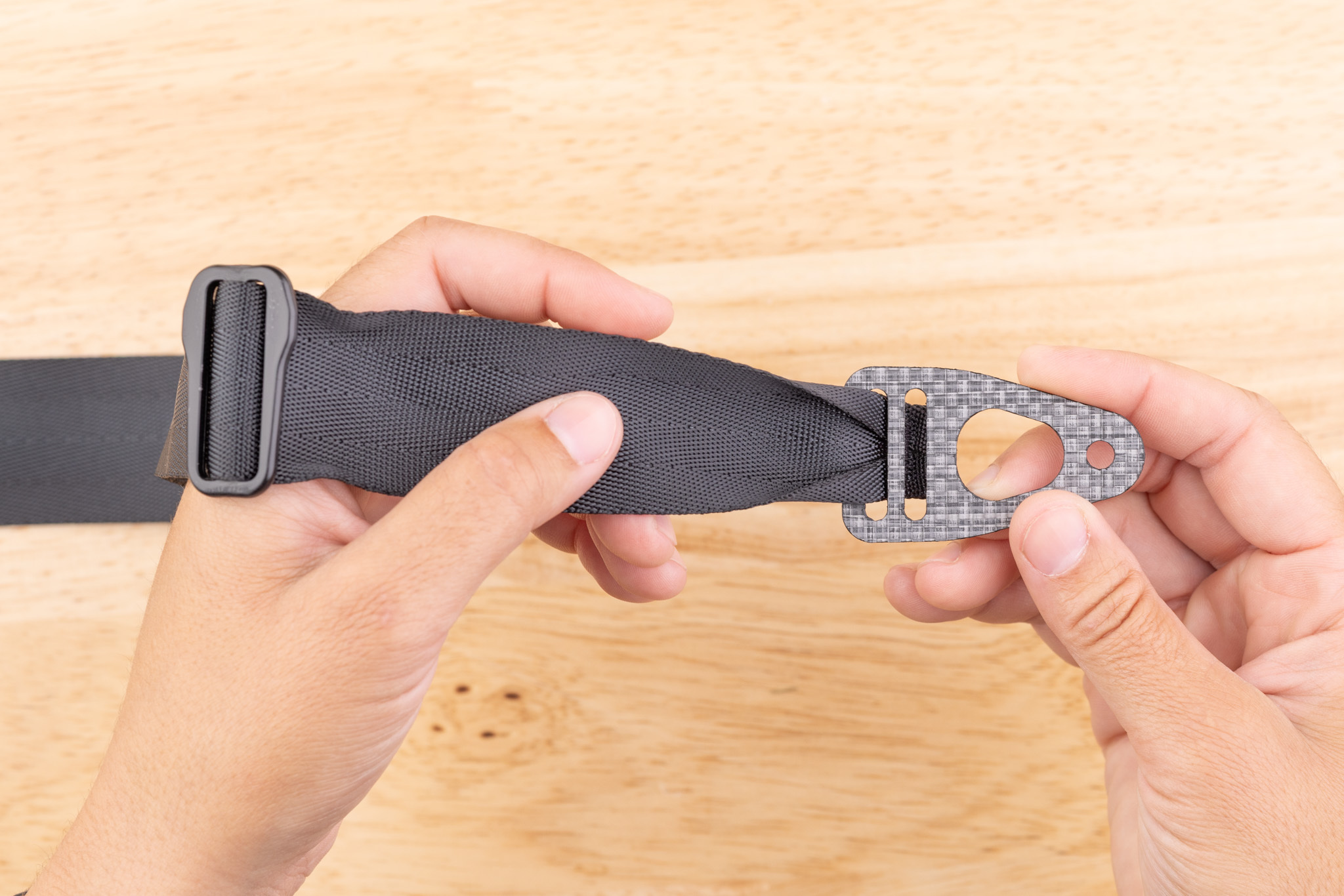 Photo of the double slotted Enigma belt end, showing both slots.