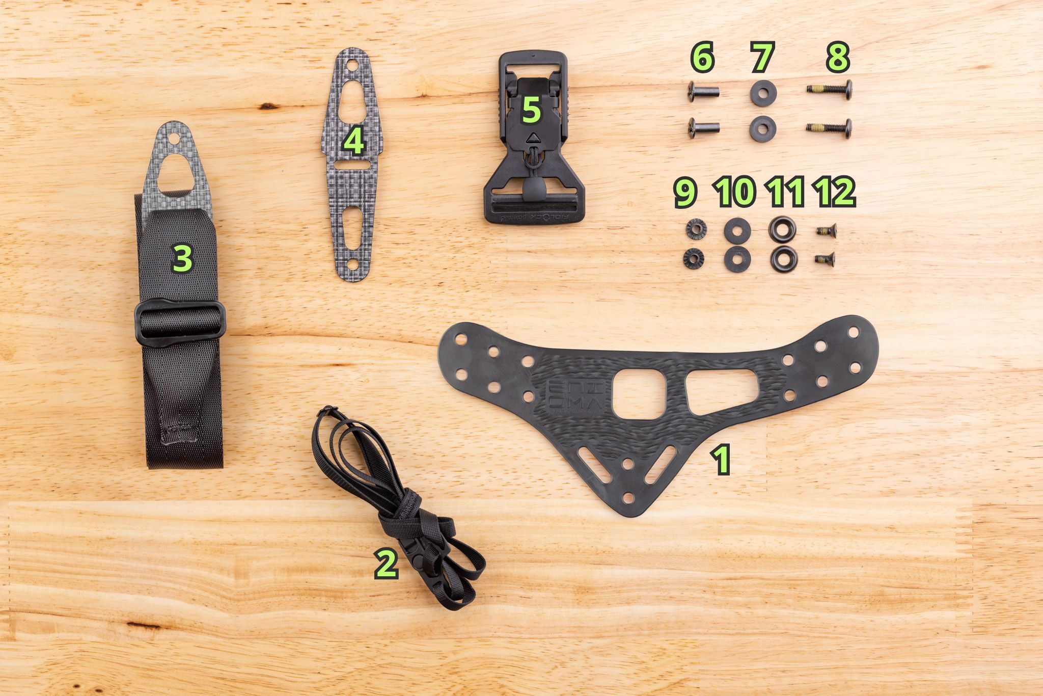 Flat lay photo of all twelve Standard Enigma OS parts, numbered to match the list below.