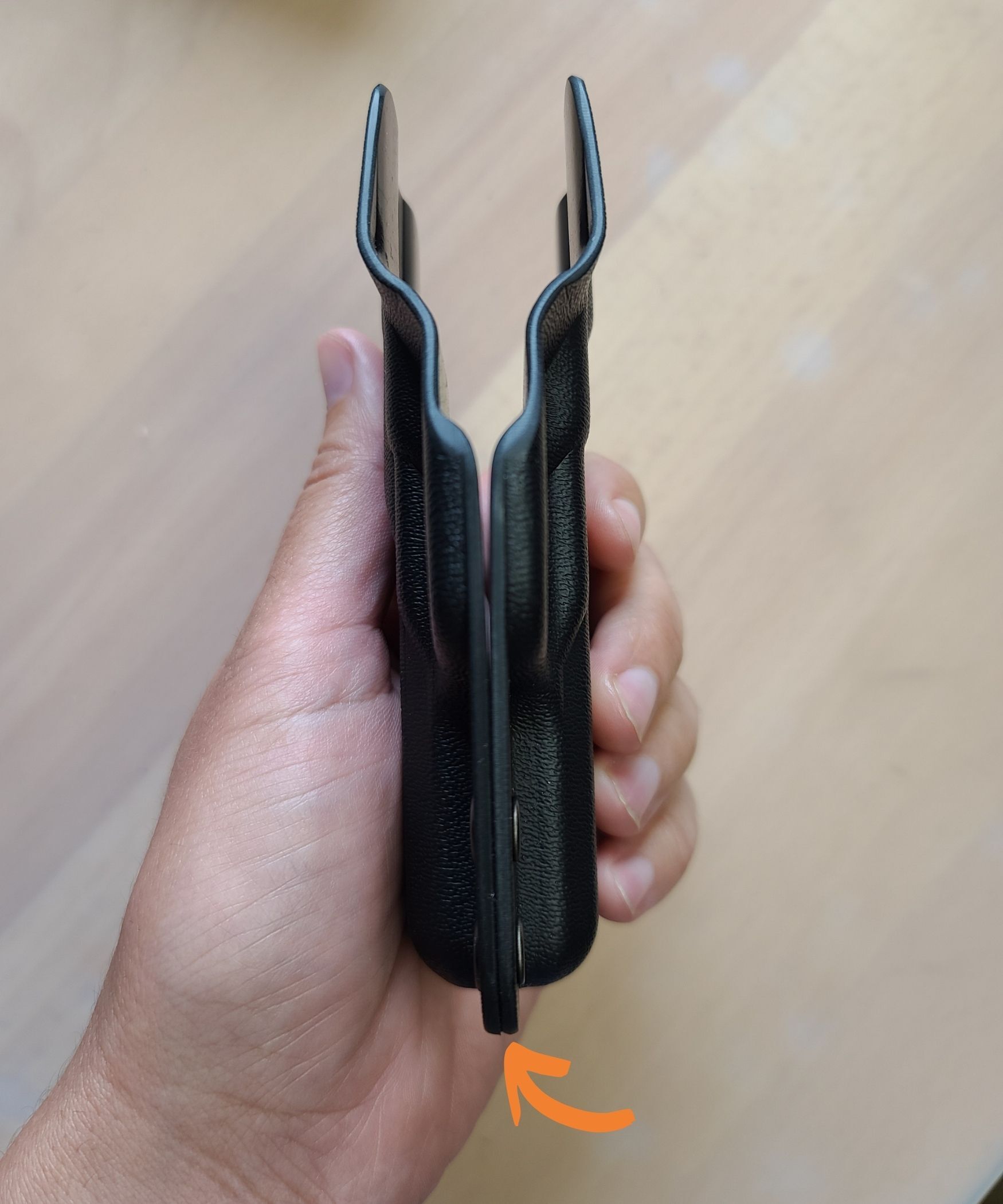 Fixed retention holster - two halves fit flush with no gap between them
