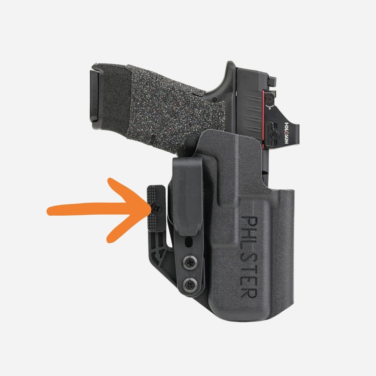 Diagram illustrating how a holster wing rotates the grip inward toward the body.
