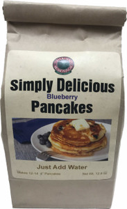Our Simply Delicious Blueberry Pancakes are sure to impress. Our mix is carefully handcrafted with real dried Blueberries. They are so simple all you need to add is water. Pair the mix with any of our homemade syrups for a breakfast twist. This mix yields 12-14 4” Pancakes. 