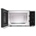 Open box of Whirlpool® 1.6 cu. ft. Sensor Cooking Microwave YWMCS7022SZ