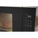 Open box of Whirlpool® 1.6 cu. ft. Sensor Cooking Microwave YWMCS7022SZ