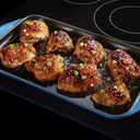 Maytag® 30-Inch Electric Cooktop with Reversible Grill and Griddle MEC8830HB