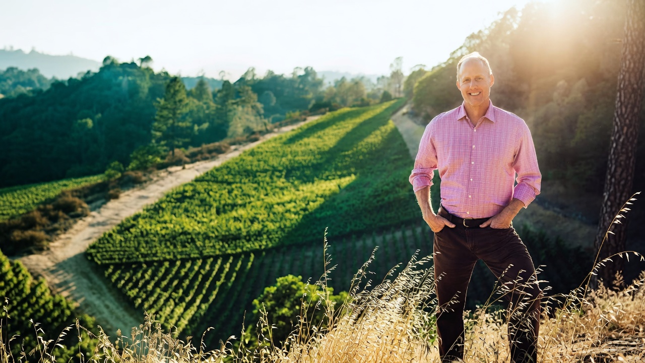 Winemaker Thomas Rivers Brown standing above a Napa Valley vineyard