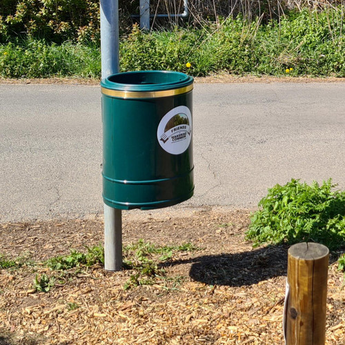 Melba Swintex Nickleby Heritage Open Top Post / Wall Litter Bin 35 Litre, green trash bin mounted on a pole in an outdoor park setting.