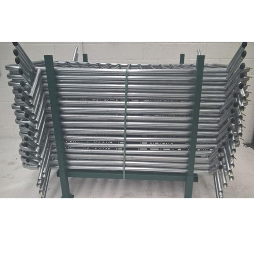 Hermeq Stillage For Metal Crowd Control Barriers, stack of metal crowd control barrier stanchions in a storage rack.