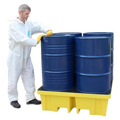 Romold BP4FW 4 Drum Bunded Spill Pallet 250ltr Sump, a yellow and black spill containment pallet holding four blue drums, with a person inspecting the drums.