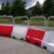 Oaklands EVO80 1.2 Metre Water Filled Barrier 29kg, outdoor event barrier with metal frame and plastic base, used for crowd control and safety on roads or construction sites.